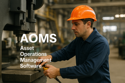 Industrial worker in a hardhat operating machinery inside a manufacturing plant with AOMS Asset Operations Management Software